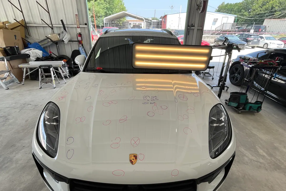 Hood marked for precision dent repair