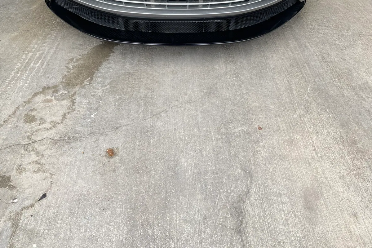 Close-up inspection of a repaired vehicle bumper