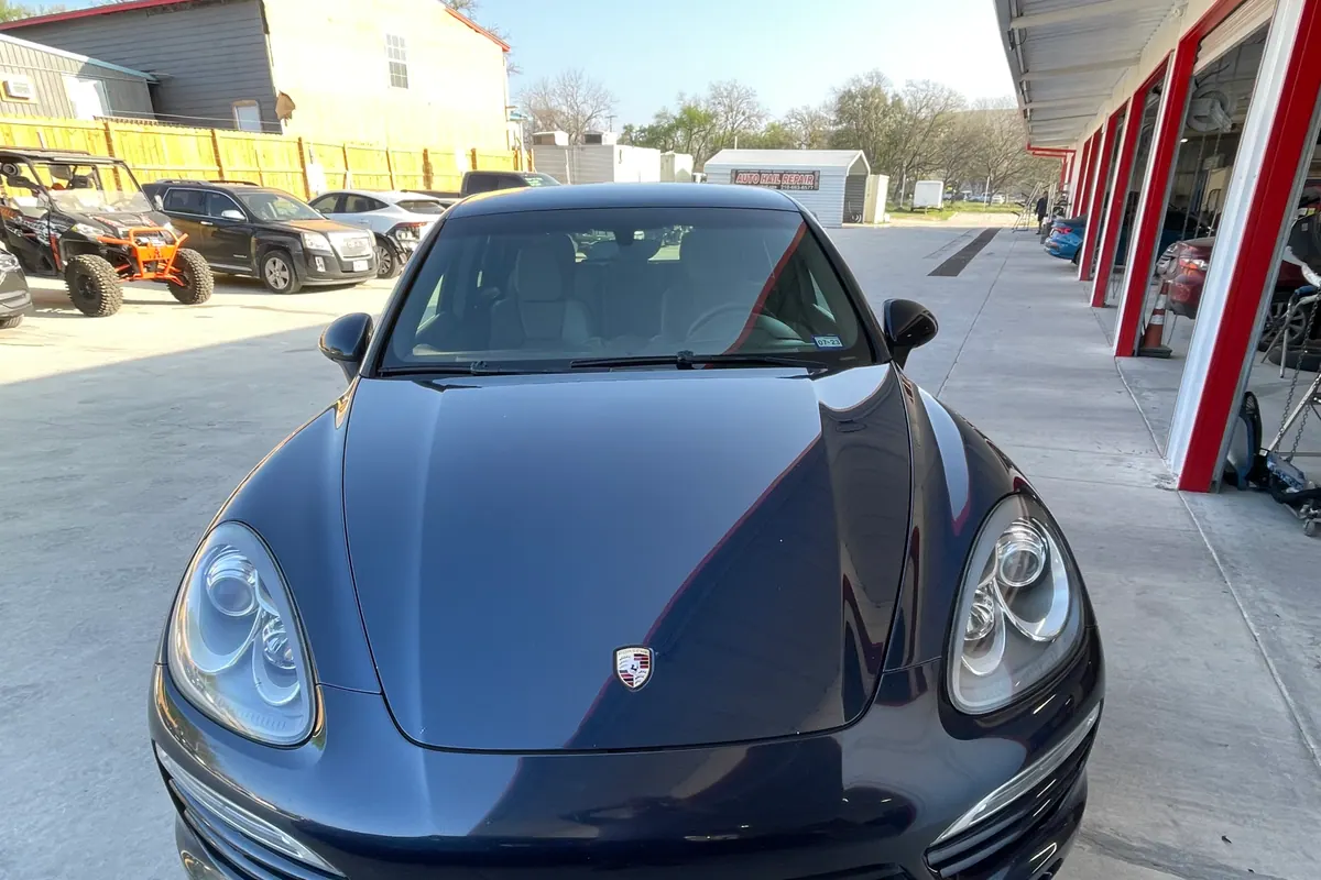 Blue Porsche after exterior repair